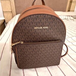 Michael Kors Brown Signature MK Dome Backpack with Gold Zips